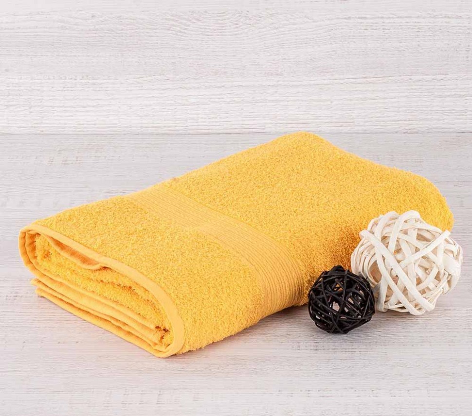 Махровое полотенце Байрамали желтого цвета 420г/м2 фото 1 — Мартекс